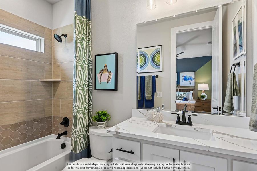 Bathroom with white vanity, marble countertop, tiled tub-shower combo, and large mirror reflecting bedroom Bathroom with white vanity, marble countertop, tiled tub-shower combo, and large mirror reflecting bedroom