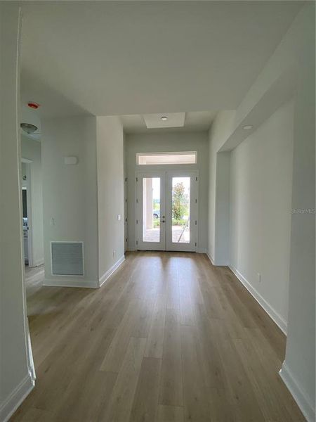 Spacious, unfurnished interior of a new home in The Reserve at Victoria, Deland (Image 12).
