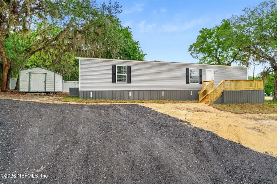 Exterior details and patio area of a home in , Satsuma (Image 27). Exterior details and patio area of a home in , Satsuma (Image 27).
