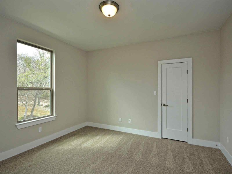 Representative unfurnished interior of a home built from the Madera II by Giddens Homes in Scofield Farms Estates, Georgetown (Image 431).