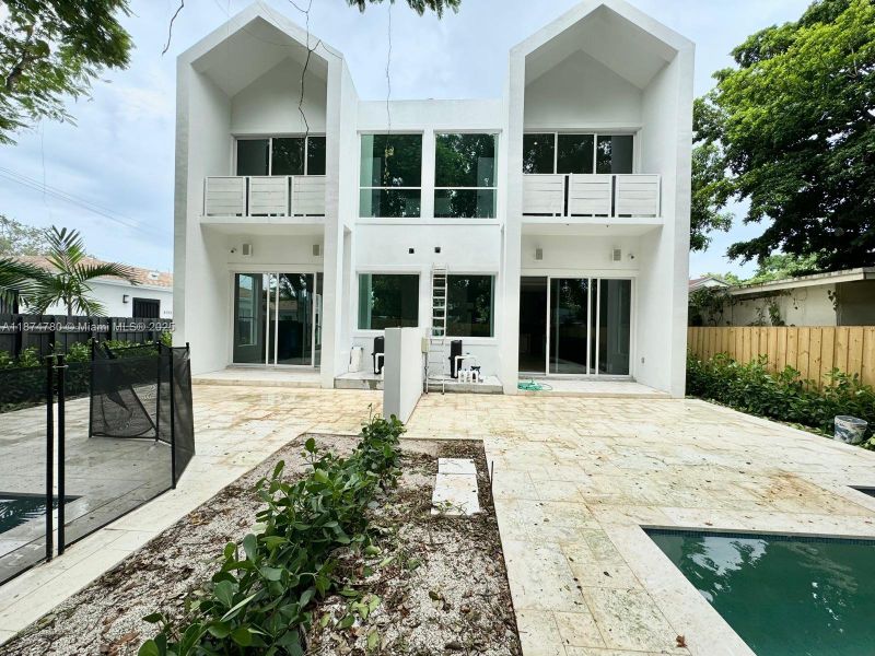 Front exterior of a new home in , Miami, FL, highlighting curb appeal (Image 23).