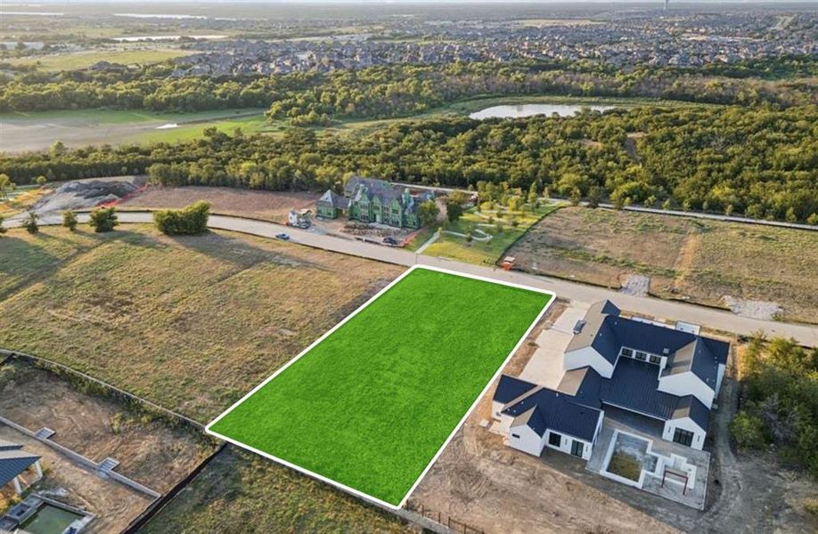 View of property location with property boundaries highlighted and a nearby body of water