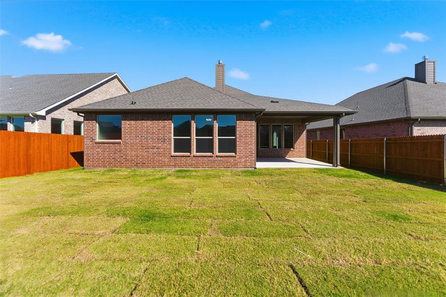 Exterior details and patio area of a home in Northstar, Haslet (Image 25).