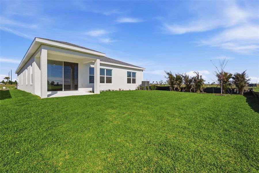 Exterior details and patio area of a home in Coasterra, Palmetto (Image 26).