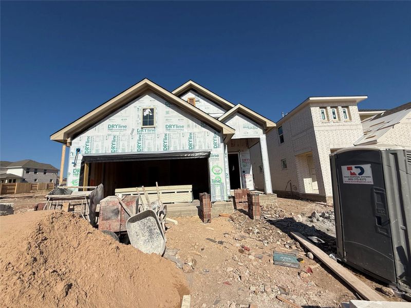 In-progress construction of a new home in The Cottages at La Cima, San Marcos, TX (Image 12).