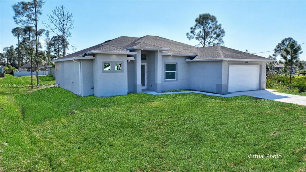 Front exterior of a new home in , Lehigh Acres, FL, highlighting curb appeal (Image 20). Front exterior of a new home in , Lehigh Acres, FL, highlighting curb appeal (Image 20).