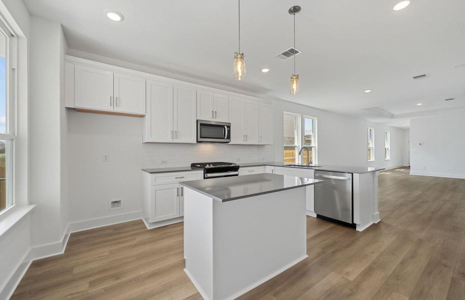 Furnished interior view inside a new home in Crosswinds, Kyle (Image 7).