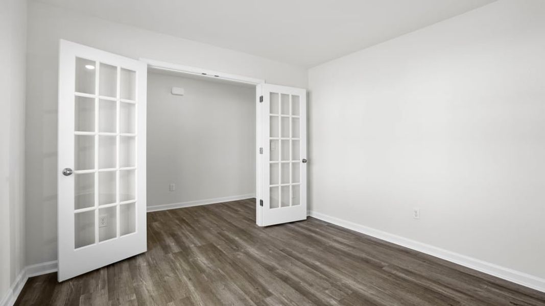 Spacious, unfurnished interior of a new home in Bentley Park, Greenwood (Image 16).