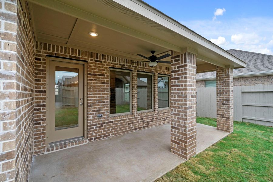 Exterior details and patio area of a home in Pomona 50' & 55', Manvel (Image 3).
