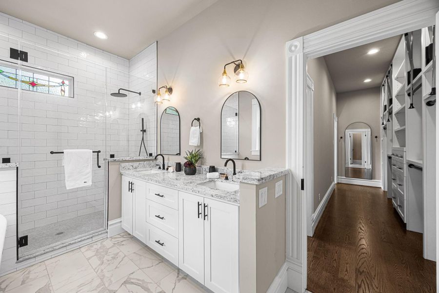 Easy access from the primary bathroom to the closet. Easy access from the primary bathroom to the closet.