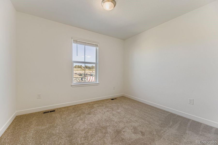 Spacious, unfurnished interior of a new home in Vermilion Creek: The Pioneer Collection, Centennial (Image 9).