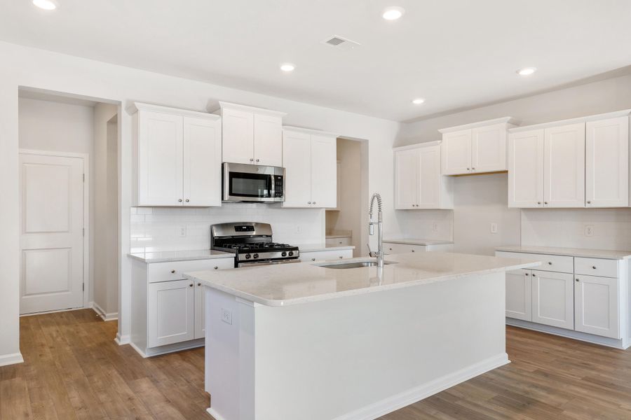 Furnished interior view inside a new home in Sweetgrass at Summers Corner, Summerville (Image 7).