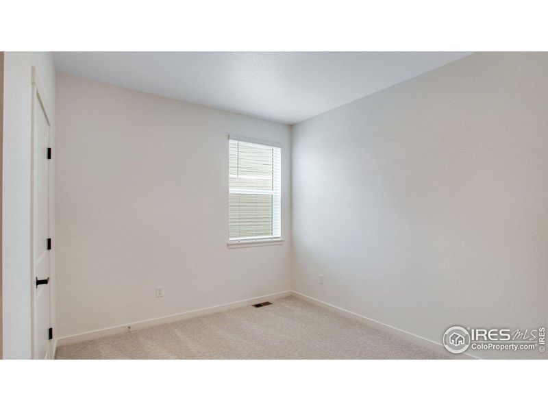 Spacious, unfurnished interior of a new home in Hansen Farm, Fort Collins (Image 25).