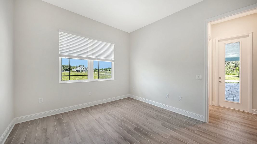 Spacious, unfurnished interior of a new home in Canoe Creek Real Estate and Homes for Sale in Parrish, FL - Neal Communities, Parrish (Image 66).