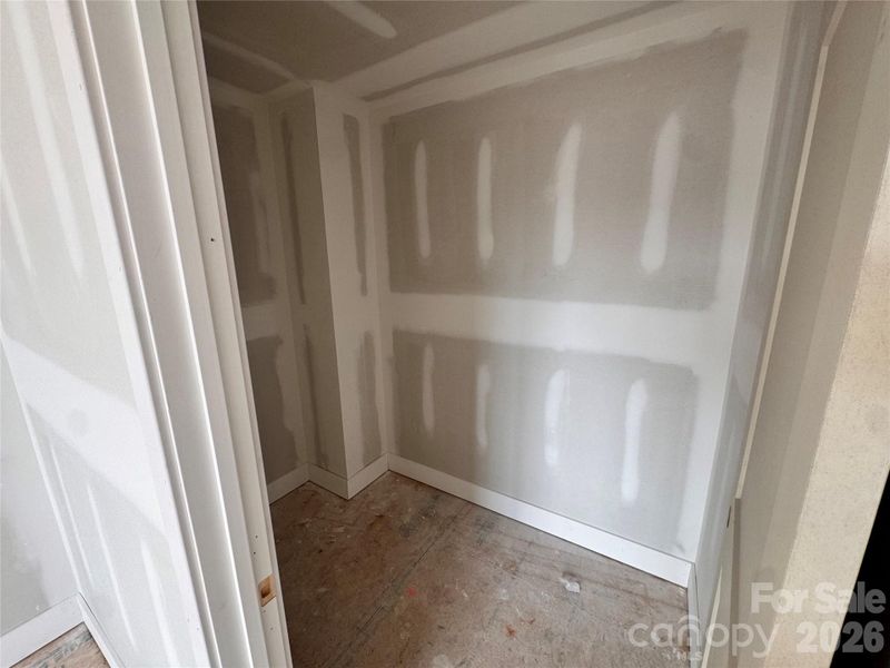 Primary walk in closet Primary walk in closet