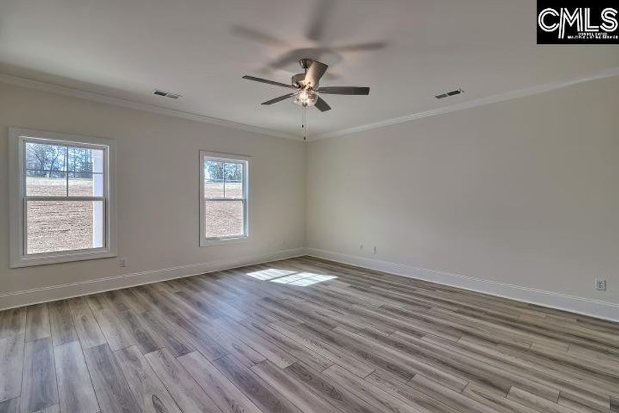Spacious, unfurnished interior of a new home in Cottages at Roofs Pond, West Columbia (Image 27).