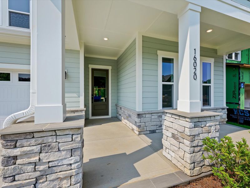Exterior details and patio area of a home in The Reserve at Cadia Village, Matthews (Image 23). Exterior details and patio area of a home in The Reserve at Cadia Village, Matthews (Image 23).