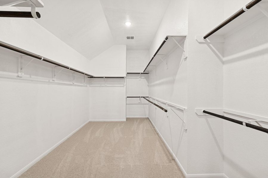 Walk-in closet in the owner's suite (*Photo not of actual home and used for illustration purposes only.) Walk-in closet in the owner's suite (*Photo not of actual home and used for illustration purposes only.)