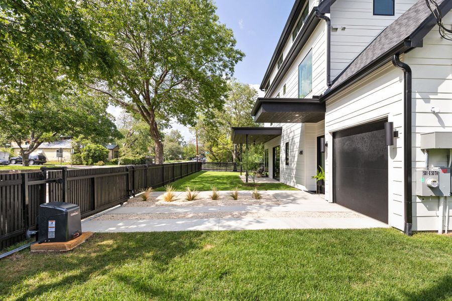 Fenced backyard featuring a patio