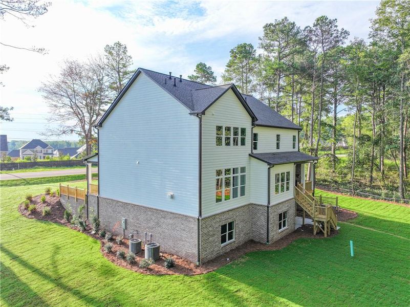 Front exterior of a new home in , Cumming, GA, highlighting curb appeal (Image 34). Front exterior of a new home in , Cumming, GA, highlighting curb appeal (Image 34).