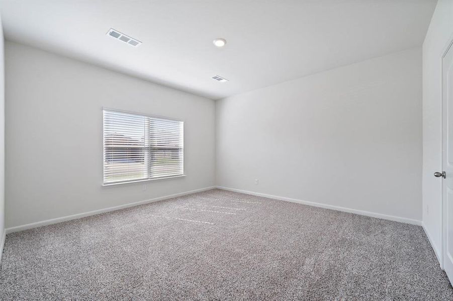 Unfurnished room featuring carpet floors