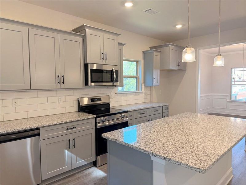 Furnished interior view inside a new home in Magnolia Villas, Cornelia (Image 6).