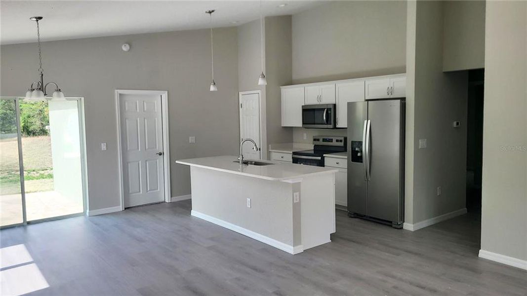 Furnished interior view inside a new home in , Dunnellon (Image 11).