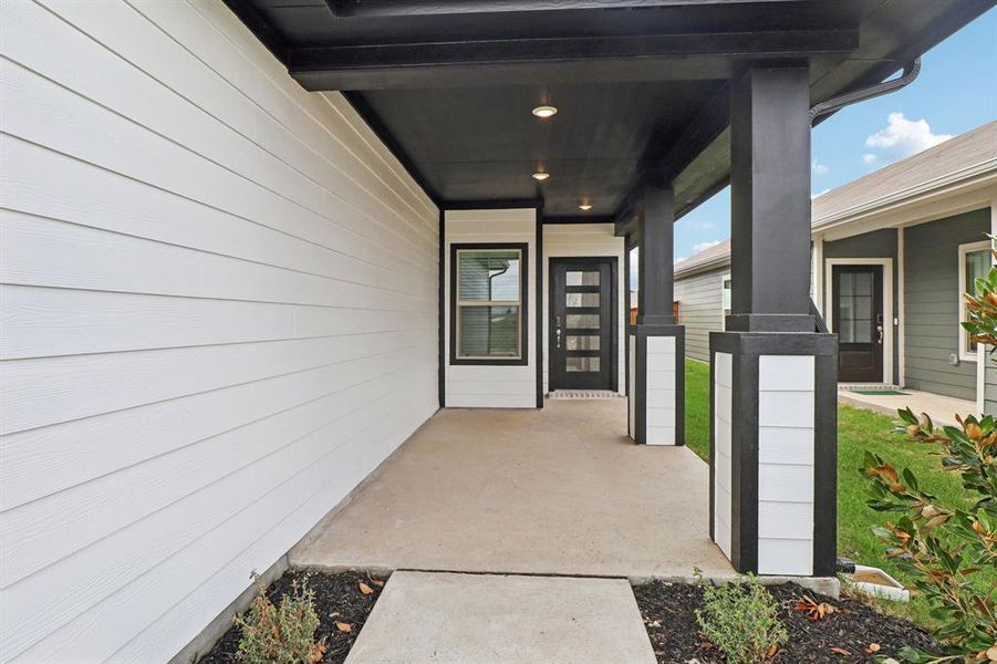Exterior details and patio area of a home in Lakehaven - Spring Series, Farmersville (Image 20).