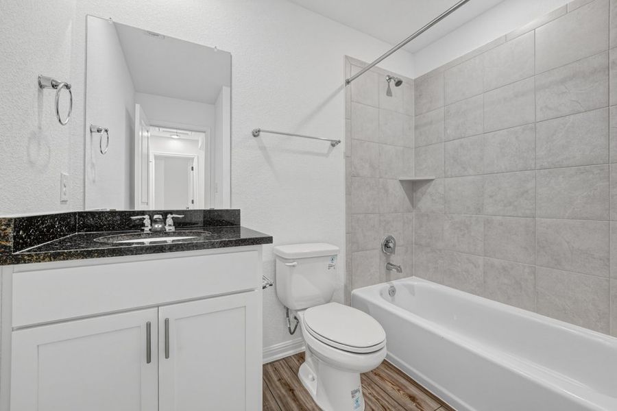 Representative furnished interior of a home built from the Pheasant by Taylor Morrison in Emory Crossing, Hutto (Image 6).