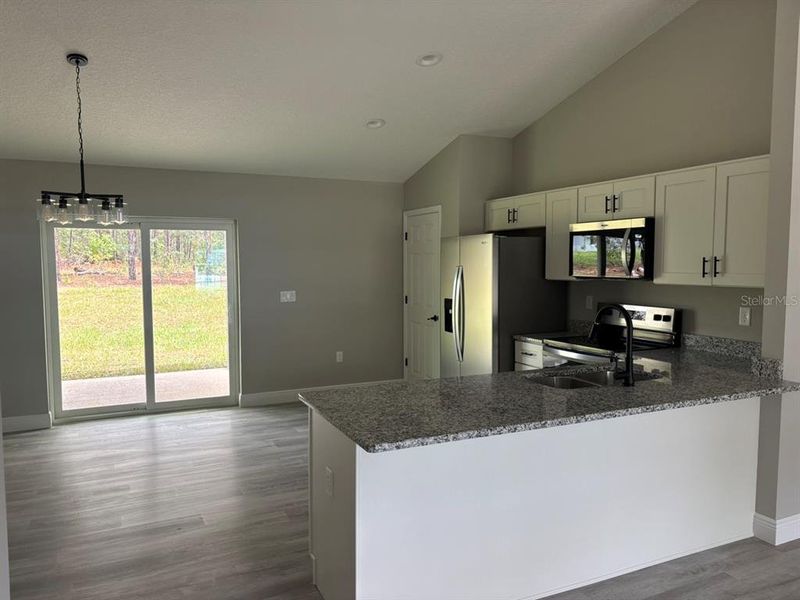 Furnished interior view inside a new home in , Dunnellon (Image 6).