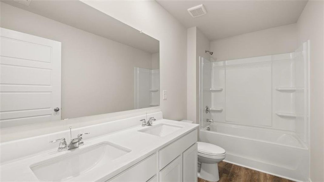 Furnished interior view inside a new home in The Preserve at Agricultural Village, Perry (Image 6).