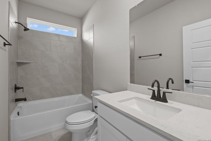 Furnished interior view inside a new home in Hannah Heights, Seguin (Image 8).