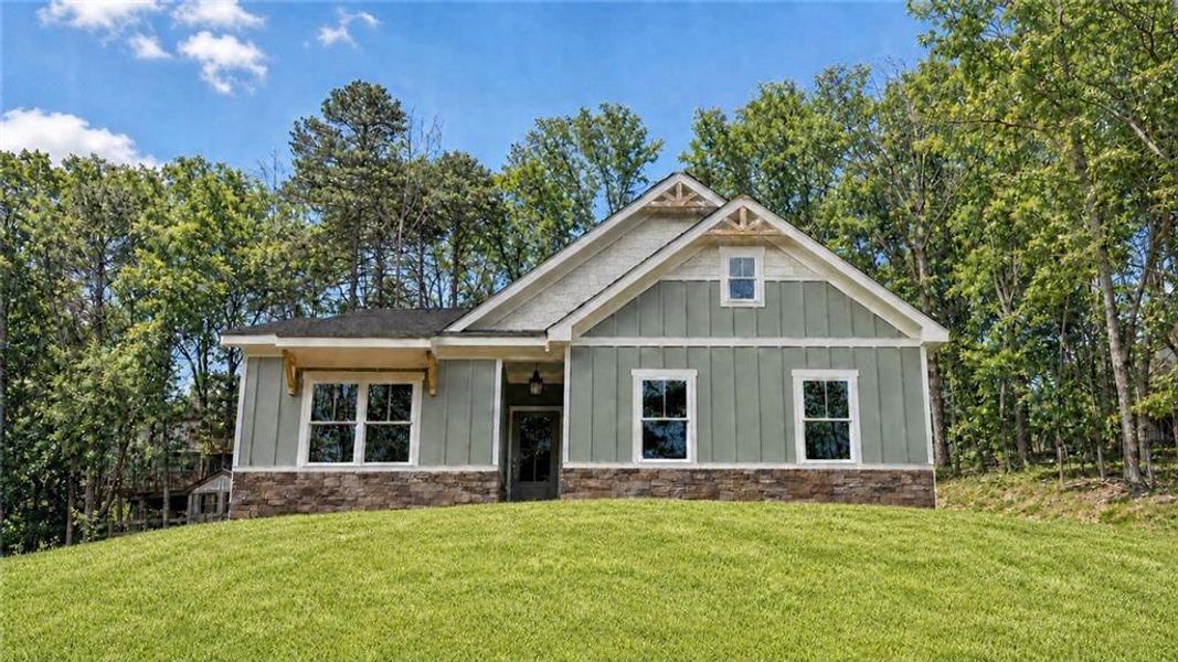 Front exterior of a new home in , Waleska, GA, highlighting curb appeal (Image 1). Front exterior of a new home in , Waleska, GA, highlighting curb appeal (Image 1).