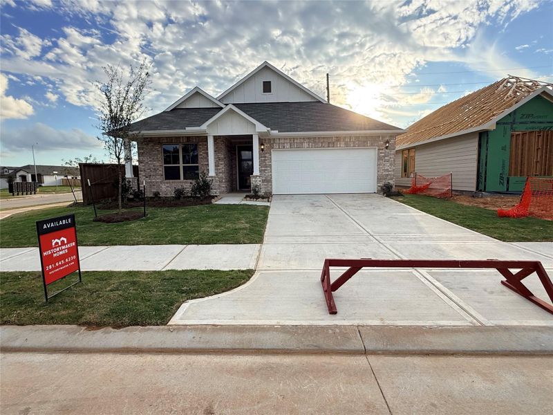 Front exterior of a new home in Colony at Pinehurst, Pinehurst, TX, highlighting curb appeal (Image 1). Front exterior of a new home in Colony at Pinehurst, Pinehurst, TX, highlighting curb appeal (Image 1).