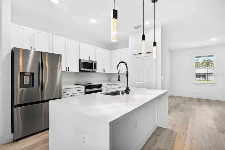 Furnished interior view inside a new home in , North Port (Image 4).
