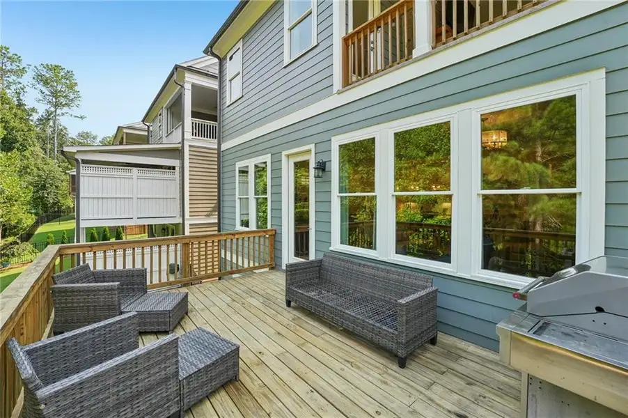 Exterior details and patio area of a home in Lakeside at River Green, Canton (Image 25).