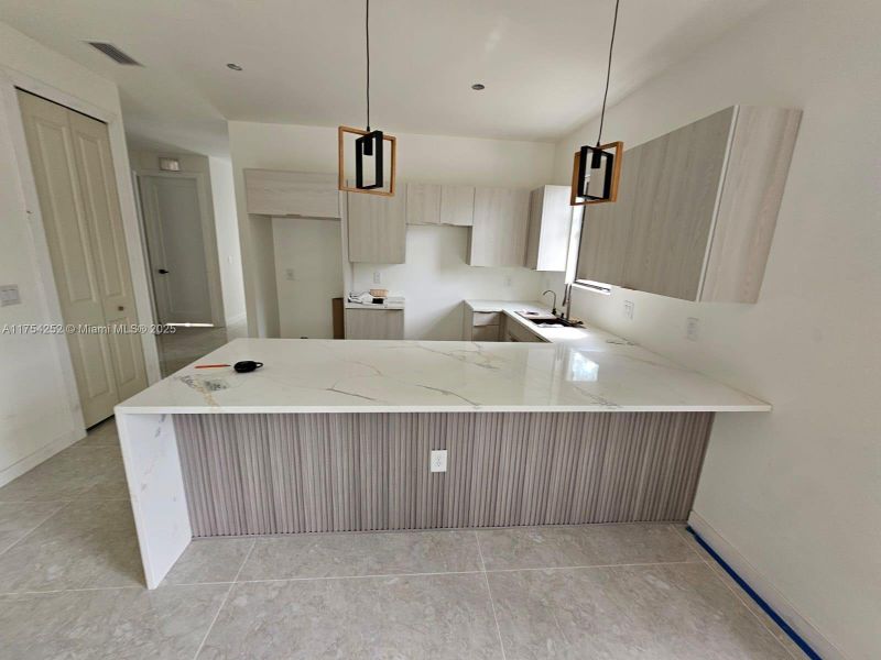 Furnished interior view inside a new home in , Punta Gorda (Image 32).