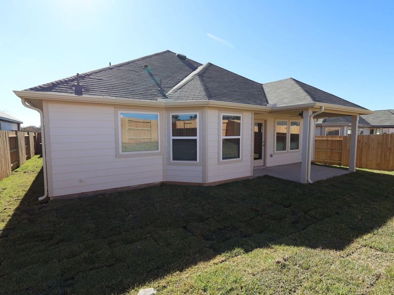 Exterior details and patio area of a home in Lone Star Landing, Montgomery (Image 27).