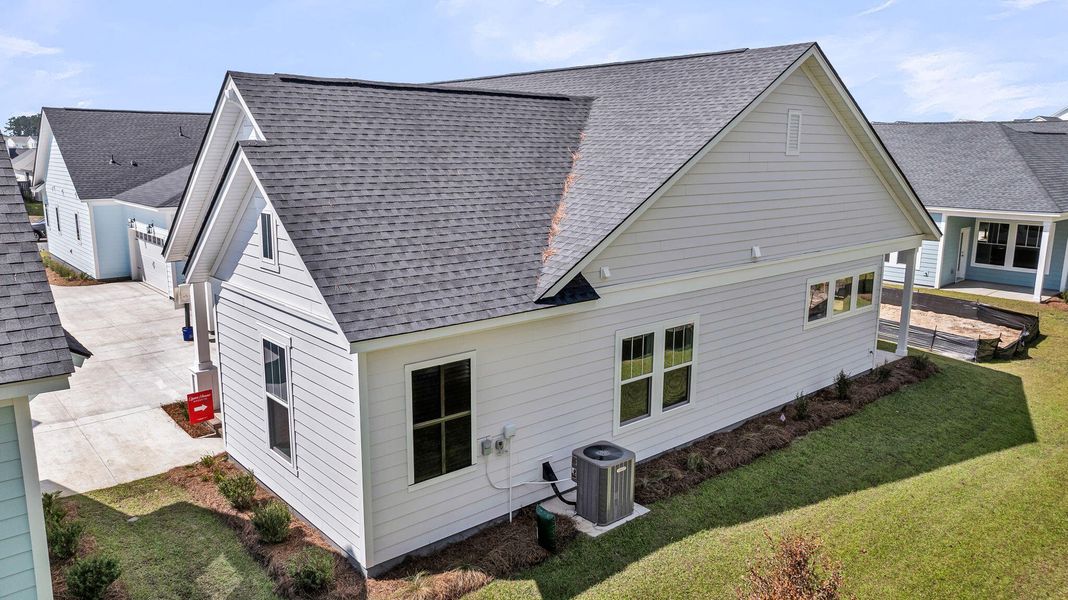 Exterior details and patio area of a home in Nexton – Midtown – The Garden Collection, Summerville (Image 3).