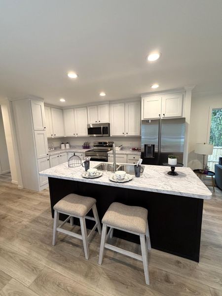 Furnished interior view inside a new home in , North Charleston (Image 10).