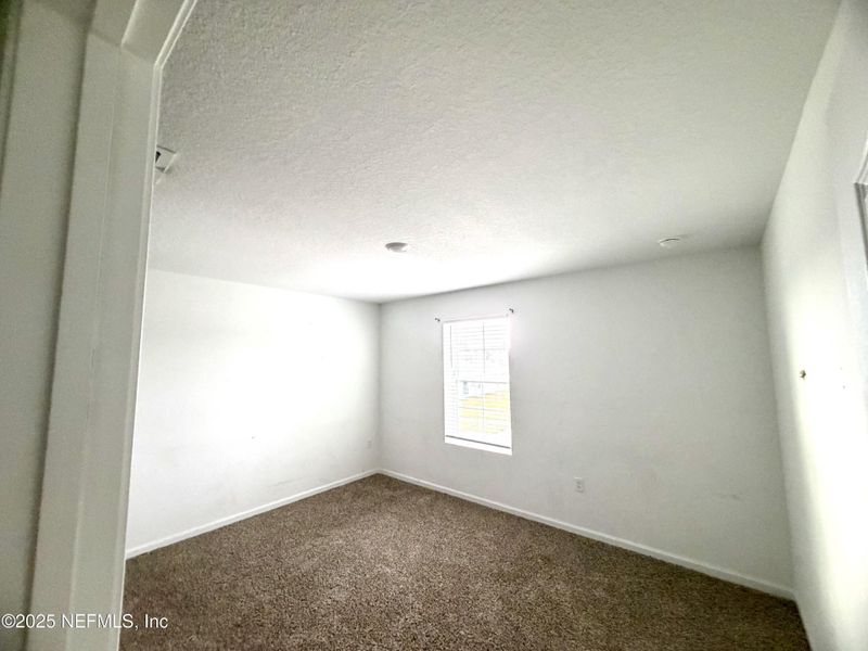 Spacious, unfurnished interior of a new home in The Arbors, Jacksonville (Image 9).