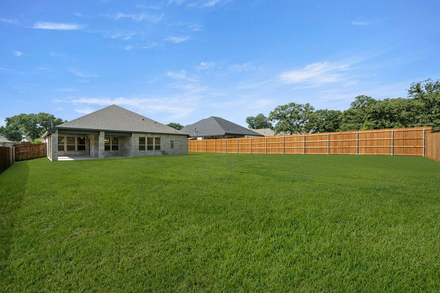 Exterior details and patio area of a home in Stone Eagle, Azle (Image 22).
