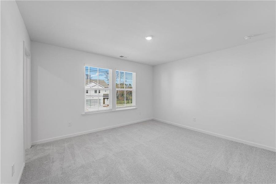 Spacious, unfurnished interior of a new home in Crossvine Village, LaGrange (Image 9).