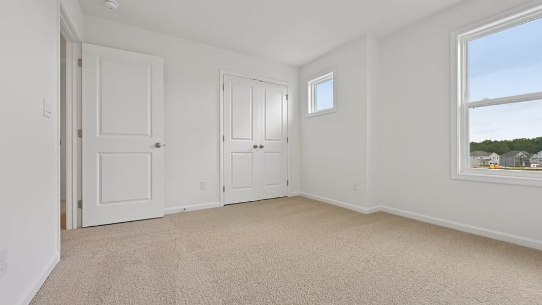 Representative unfurnished interior of a home built from the Summit by D.R. Horton in Kalas Falls, Wake Forest (Image 33).