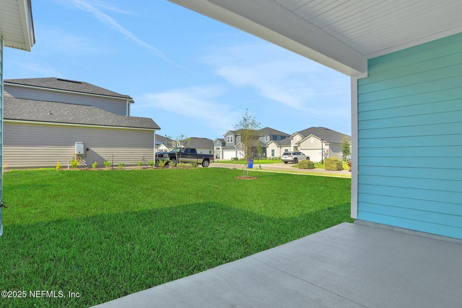 Exterior details and patio area of a home in Silver Landing at SilverLeaf, St. Augustine (Image 3).