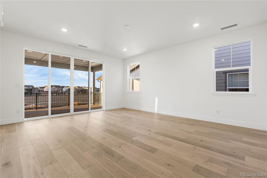 Spacious, unfurnished interior of a new home in Luxe at The Canyons, Castle Pines (Image 38).