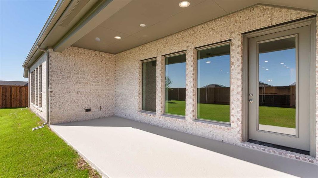 Exterior details and patio area of a home in Myrtle Creek 60', Waxahachie (Image 3).