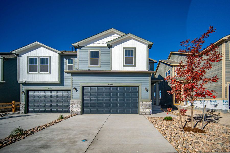 Representative exterior photo of a completed home built from the Manitou by View Homes in Aspen Meadows – Townhomes, Colorado Springs, CO (Image 27). Representative exterior photo of a completed home built from the Manitou by View Homes in Aspen Meadows – Townhomes, Colorado Springs, CO (Image 27).