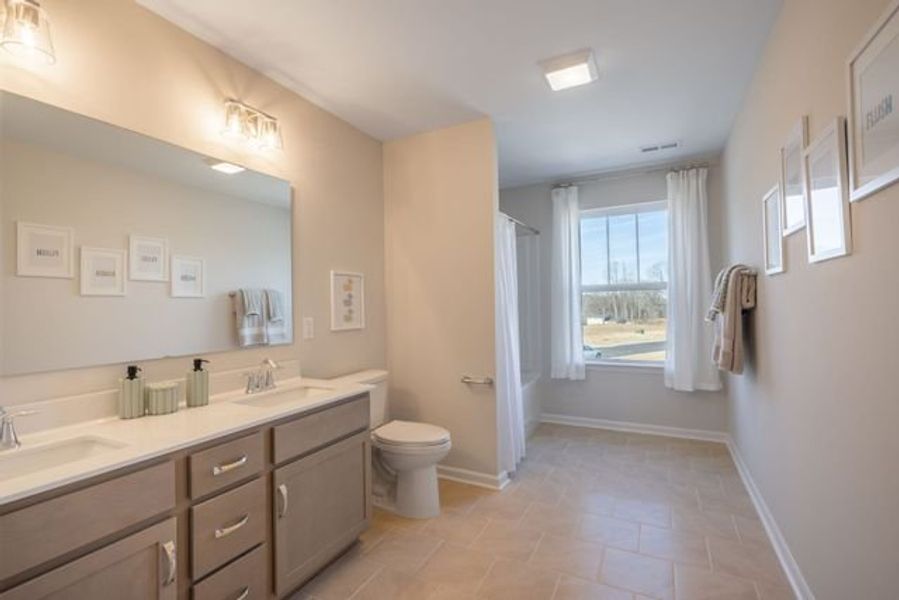 Representative furnished interior of a home built from the Lenox by True Homes in Autumn Ridge, High Shoals (Image 15).