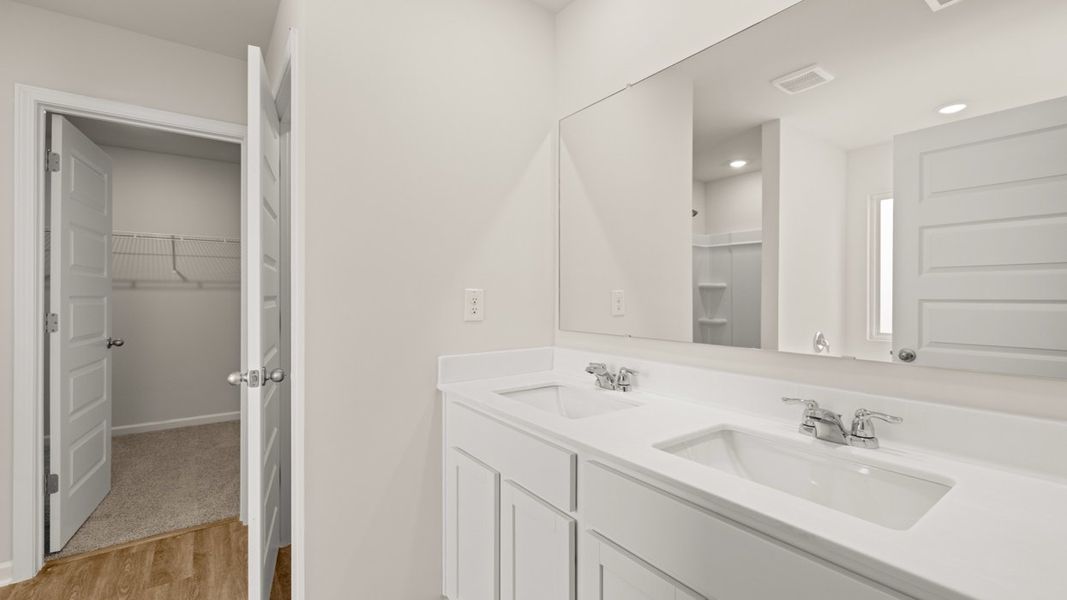 Furnished interior view inside a new home in Preserve at Dove Creek, Statham (Image 9).